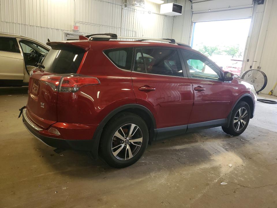 Photo 3 from auction – 2018 TOYOTA RAV4 with VIN JTMRFREV7JD256807