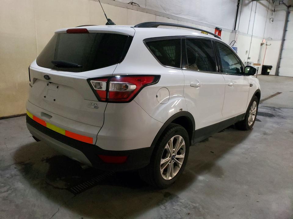 Photo 3 from auction – 2018 FORD ESCAPE with VIN 1FMCU9HD5JUC89217