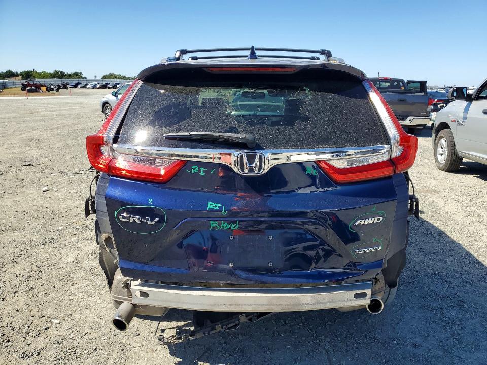 Photo 6 from auction – 2018 HONDA CR-V with VIN 7FARW2H96JE095613