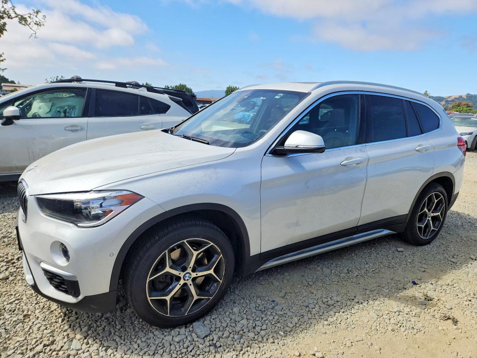 BMW X1 2018 with VIN WBXHT3C39J5L28204 - Photo from auction