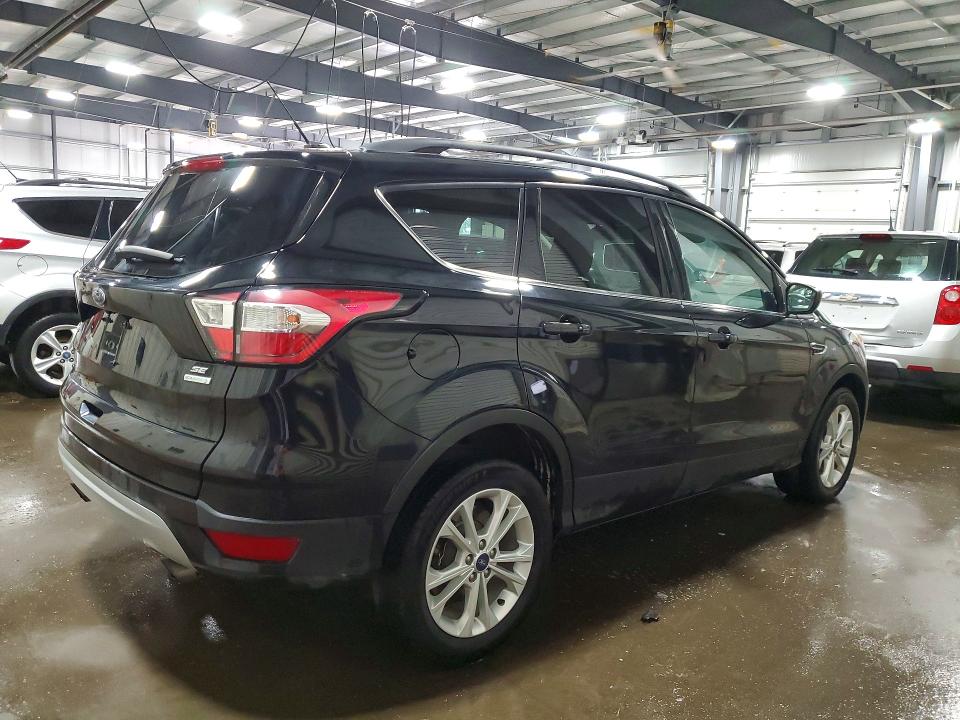 Photo 3 from auction – 2018 FORD ESCAPE with VIN 1FMCU0GD1JUB13293
