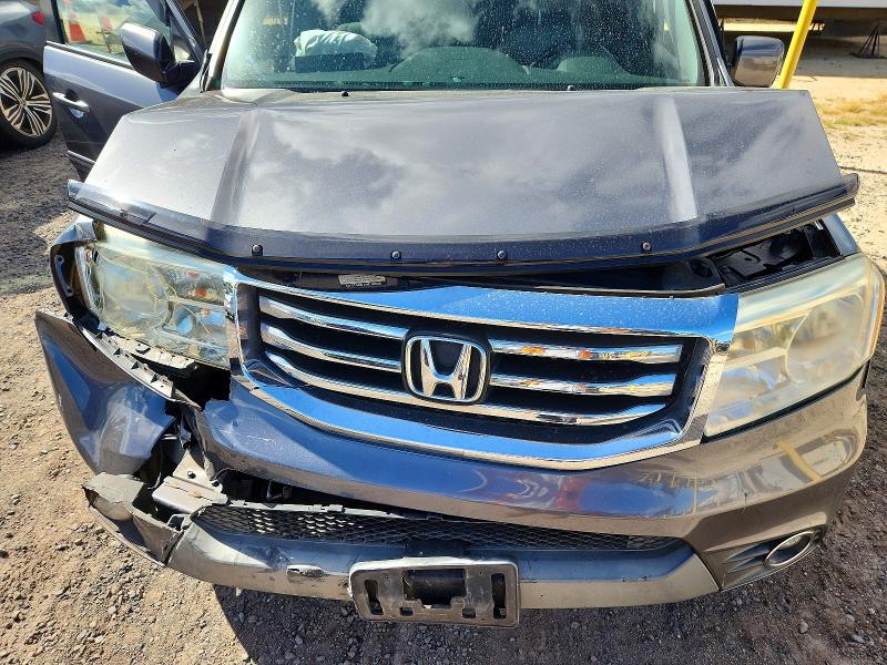 Photo 12 from auction – 2015 HONDA PILOT with VIN 5FNYF3H52FB004077