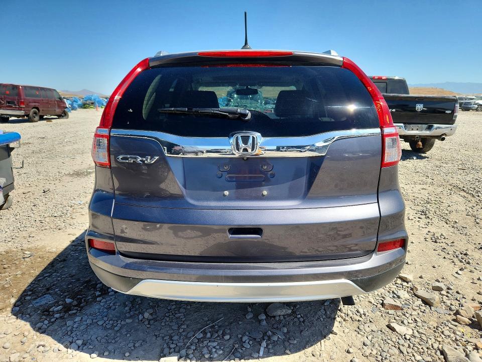 Photo 6 from auction – 2016 HONDA CR-V with VIN 2HKRM3H74GH514008