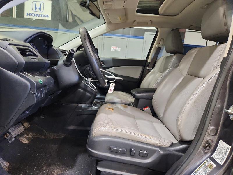 Photo 7 from auction – 2015 HONDA CR-V with VIN 2HKRM4H72FH643076