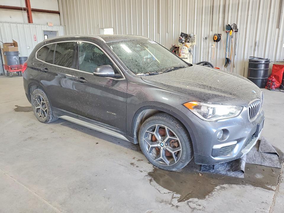 Photo 4 from auction – 2017 BMW X1 with VIN WBXHT3C36H5F68386