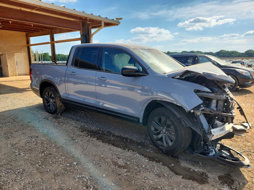 Photo 4 from auction – 2025 HONDA RIDGELINE with VIN 5FPYK3F15SB008170