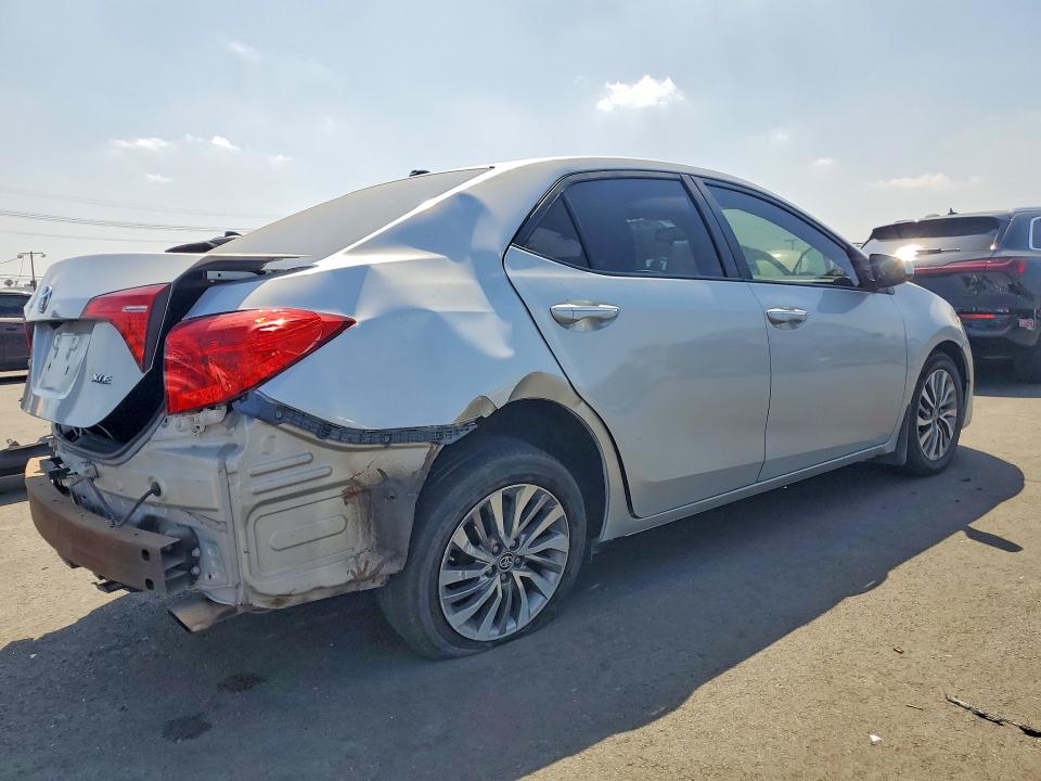 Photo 3 from auction – 2017 TOYOTA COROLLA with VIN 5YFBURHE4HP673442