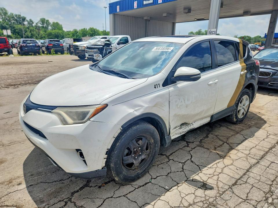 TOYOTA RAV4 2018 with VIN 2T3RFREV2JW701411 - Photo from auction