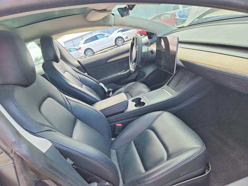 Photo 7 from auction – 2023 TESLA MODEL 3 with VIN 5YJ3E1EA7PF697474