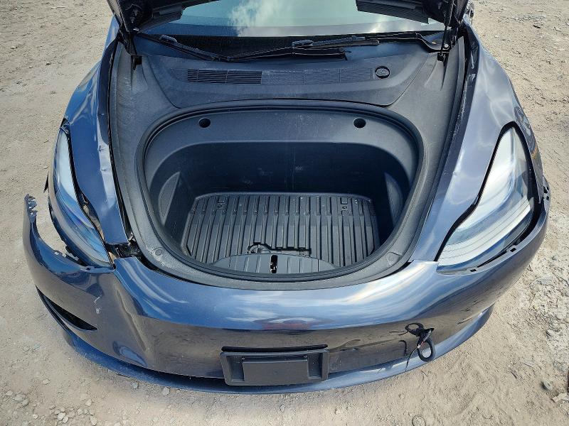 Photo 11 from auction – 2023 TESLA MODEL 3 with VIN 5YJ3E1EA7PF697474