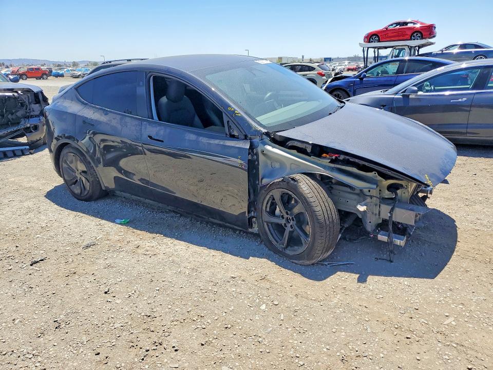 Photo 4 from auction – 2026 TESLA MODEL Y with VIN 7SAYGDED4TF443424