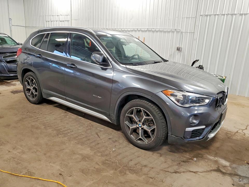 Photo 4 from auction – 2016 BMW X1 with VIN WBXHT3C36G5E53687