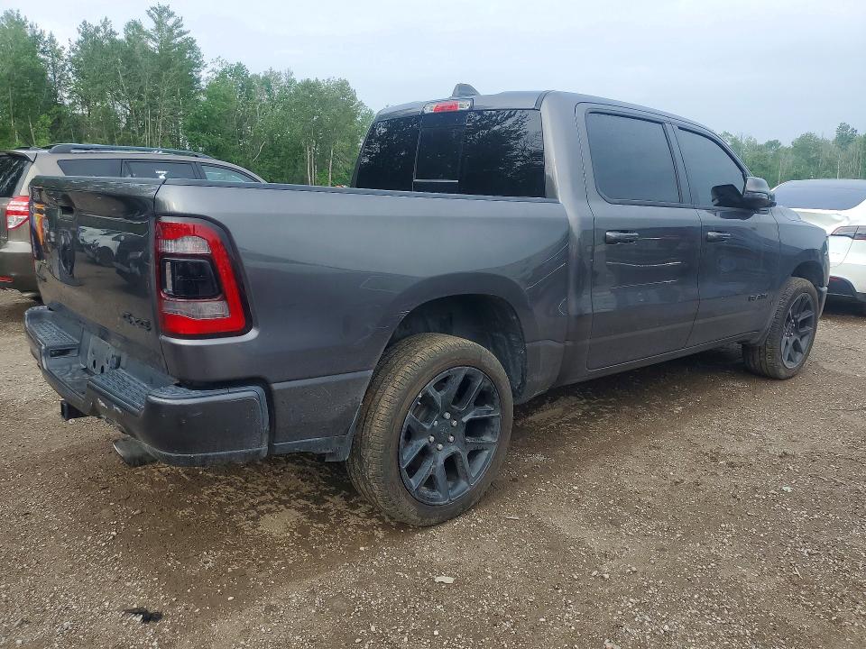 Photo 3 from auction – 2023 RAM 1500 with VIN 1C6SRFVT3PN597475