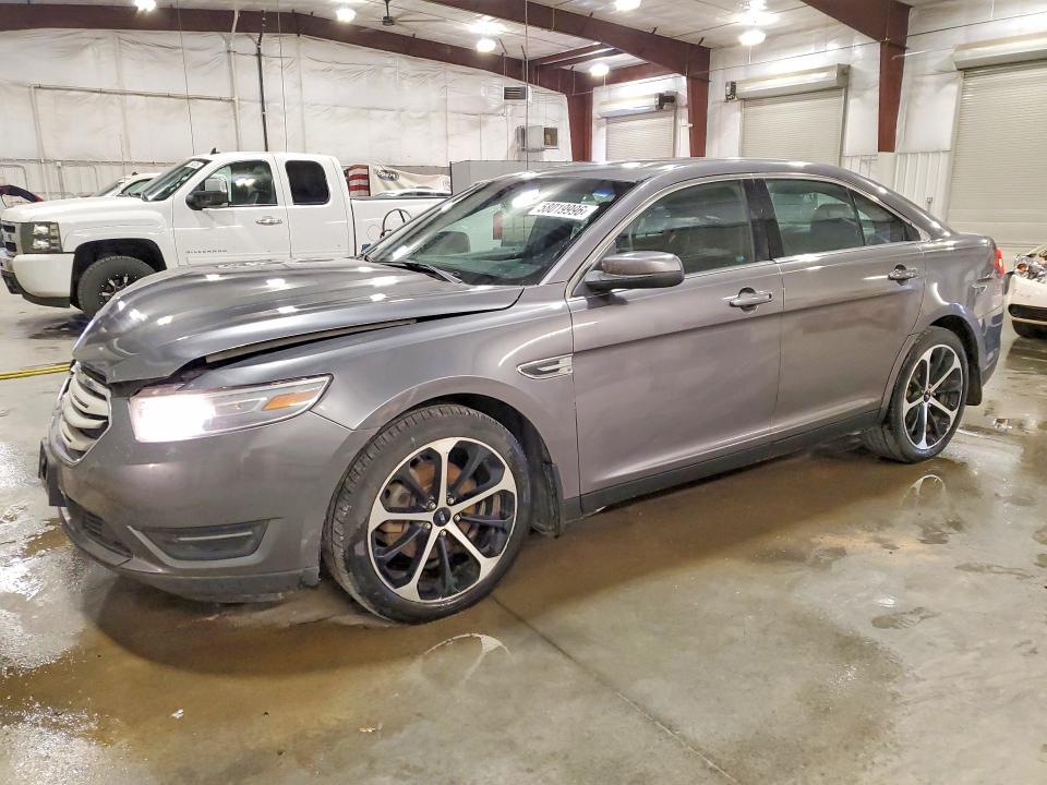 FORD TAURUS 2014 with VIN 1FAHP2H8XEG183903 - Photo from auction