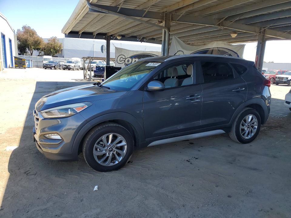 HYUNDAI TUCSON 2018 with VIN KM8J3CA40JU635224 - Photo from auction