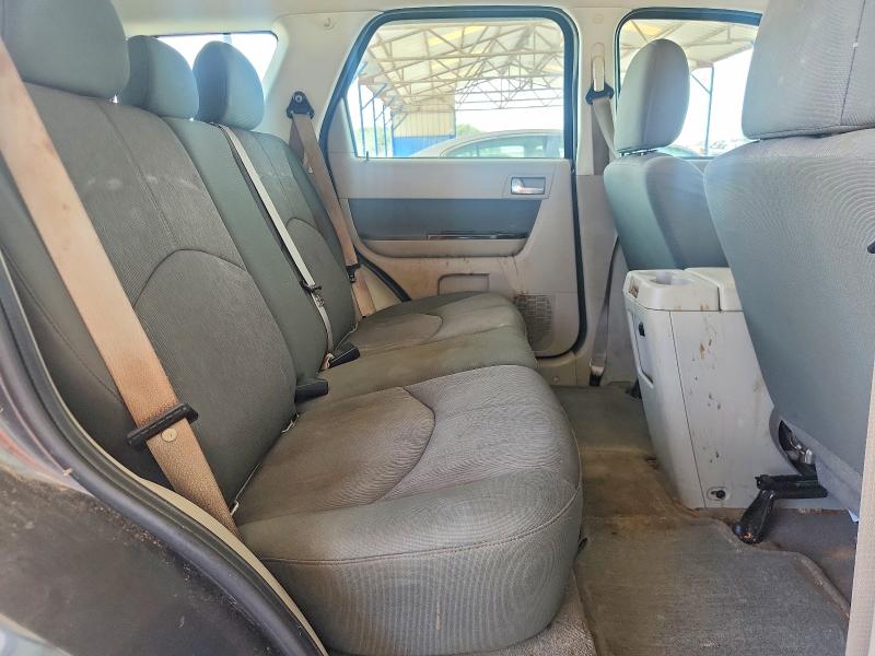 Photo 11 from auction – 2010 MAZDA TRIBUTE with VIN 4F2CY0C75AKM03508