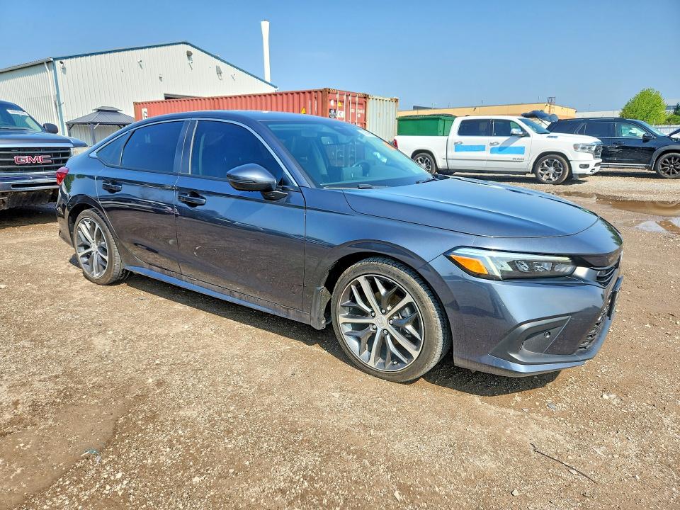 Photo 4 from auction – 2023 HONDA CIVIC with VIN 2HGFE1F90PH000353
