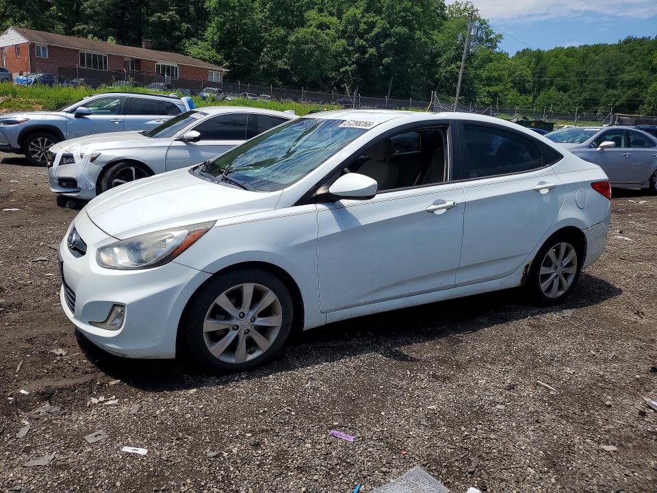 HYUNDAI ACCENT 2012 with VIN KMHCU4AEXCU061013 - Photo from auction