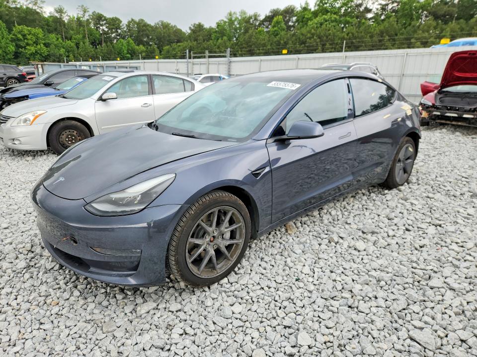 TESLA MODEL 3 2022 with VIN 5YJ3E1EB2NF184493 - Photo from auction