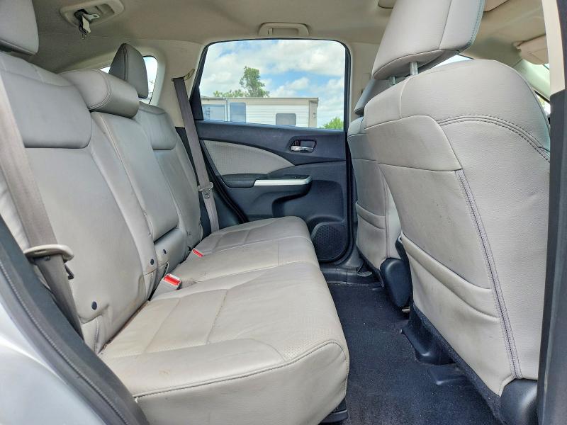 Photo 11 from auction – 2016 HONDA CR-V with VIN 2HKRM3H72GH535052