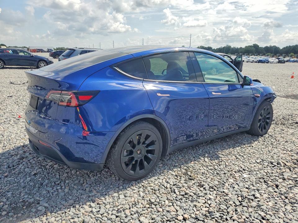 Photo 3 from auction – 2022 TESLA MODEL Y with VIN 7SAYGAEE1NF310176