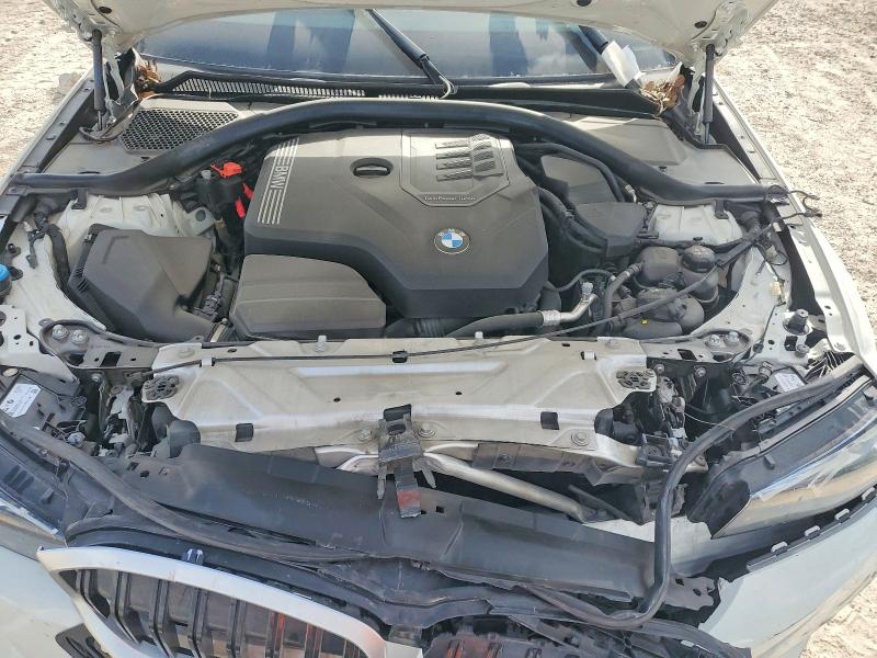 Photo 11 from auction – 2023 BMW 330I with VIN 3MW69FF09P8D69446