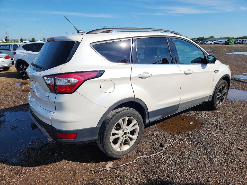 Photo 3 from auction – 2017 FORD ESCAPE with VIN 1FMCU0G9XHUE31578