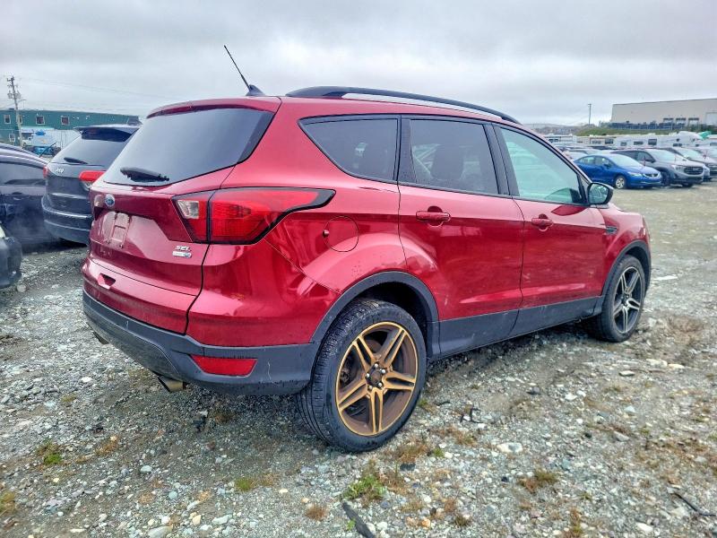 Photo 3 from auction – 2019 FORD ESCAPE with VIN 1FMCU9HD4KUA56950