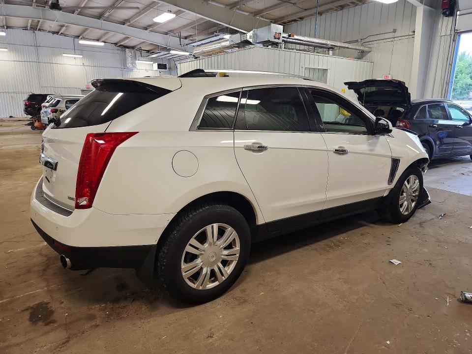 Photo 3 from auction – 2013 CADILLAC SRX with VIN 3GYFNGE32DS638377