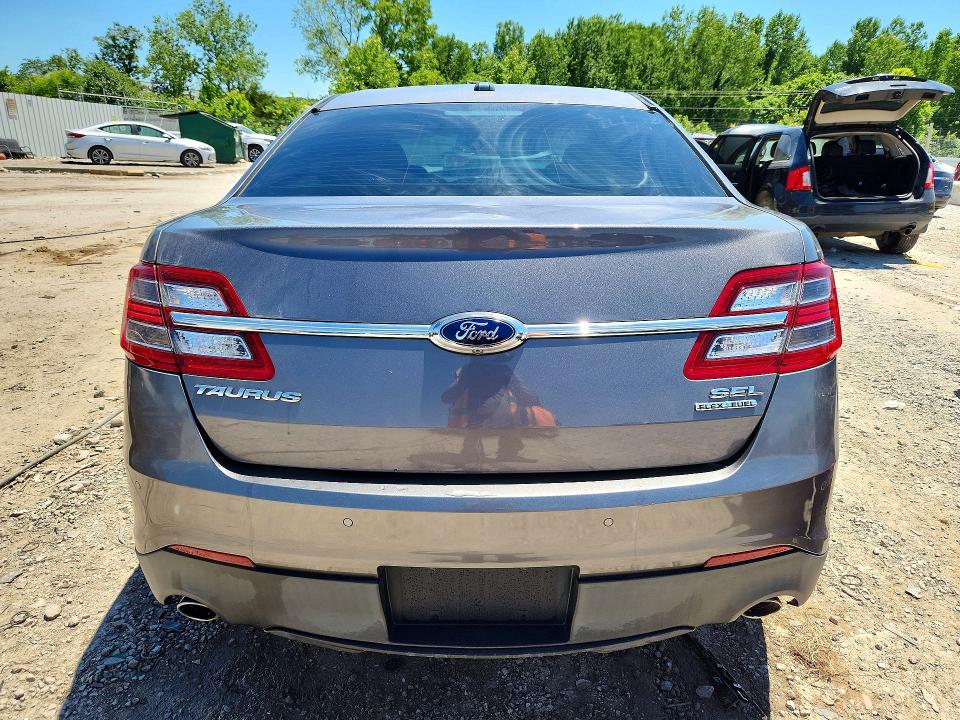 Photo 6 from auction – 2014 FORD TAURUS with VIN 1FAHP2E83EG163738