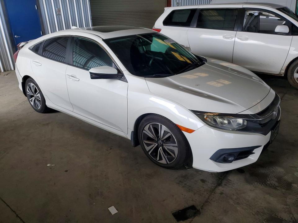 Photo 4 from auction – 2016 HONDA CIVIC with VIN 2HGFC1F39GH654947