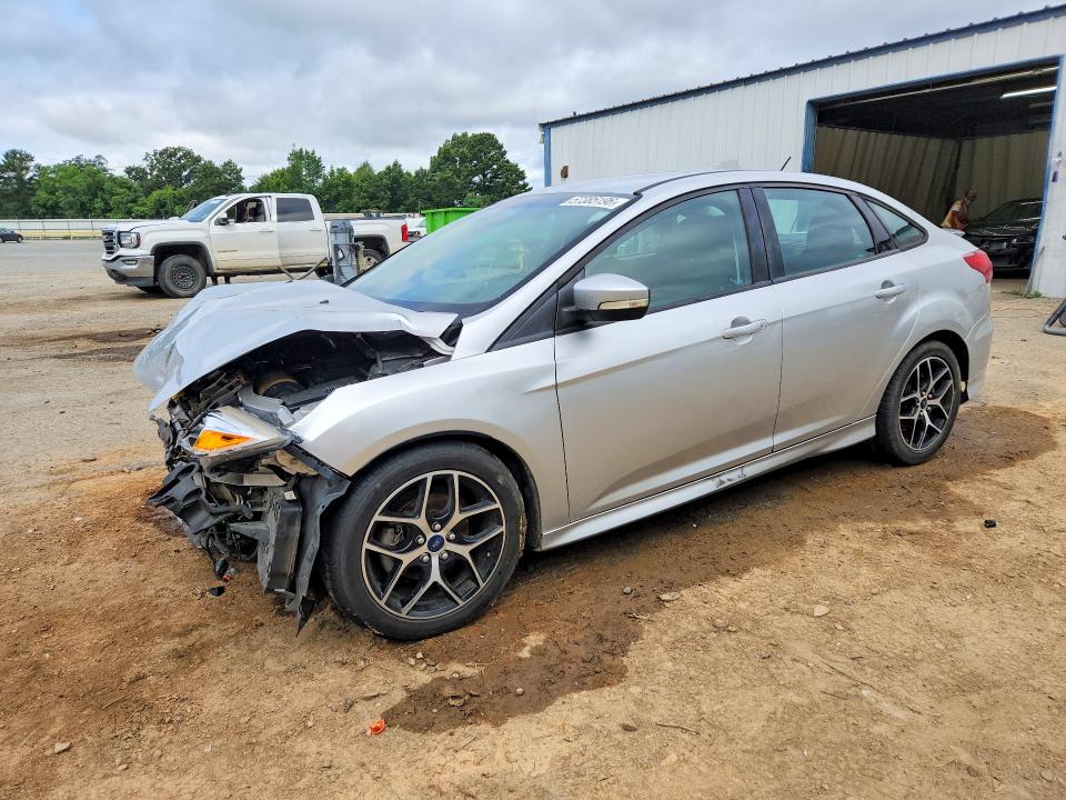 FORD FOCUS 2015 with VIN 1FADP3FE7FL379772 - Photo from auction