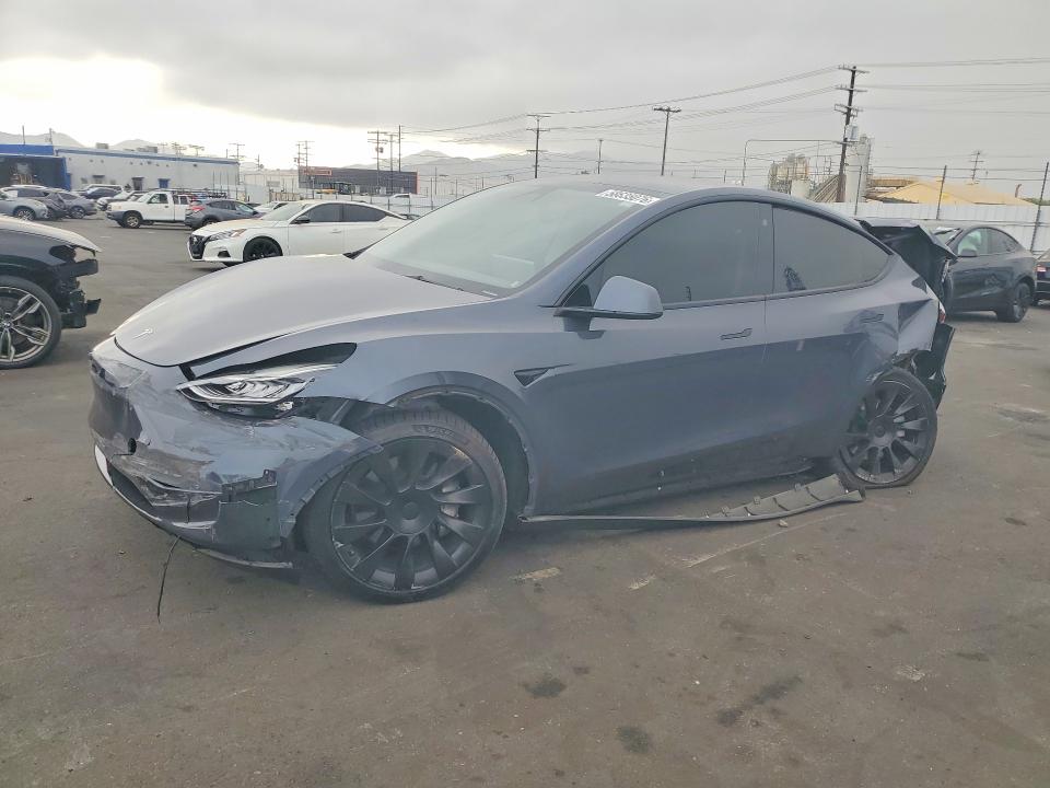 TESLA MODEL Y 2023 with VIN 7SAYGDEE0PA042738 - Photo from auction