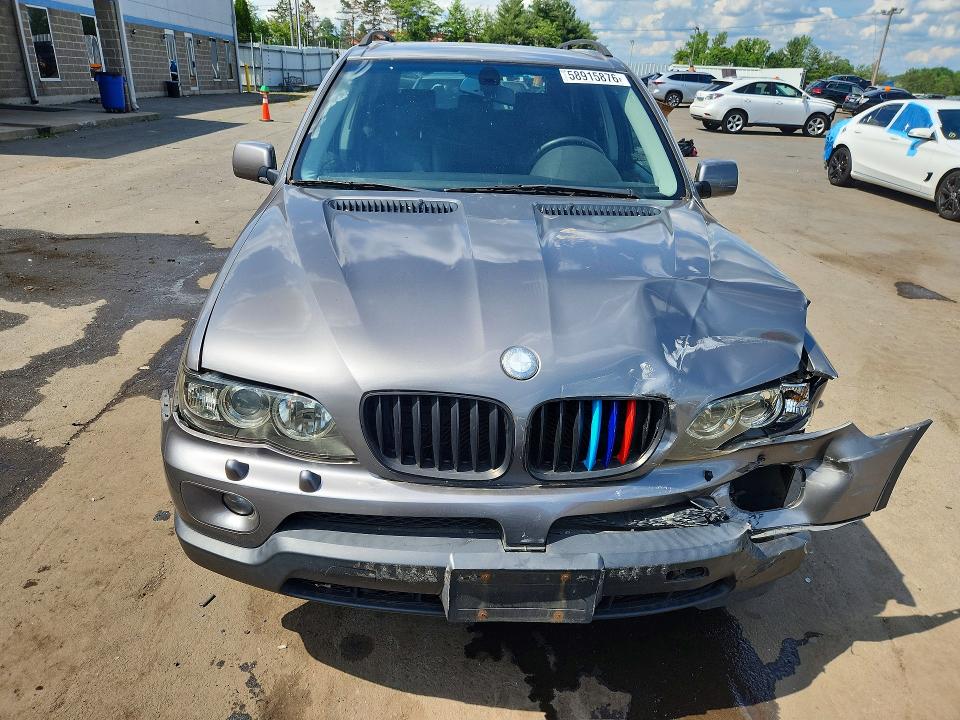 Photo 5 from auction – 2006 BMW X5 with VIN 5UXFA13586LY28050