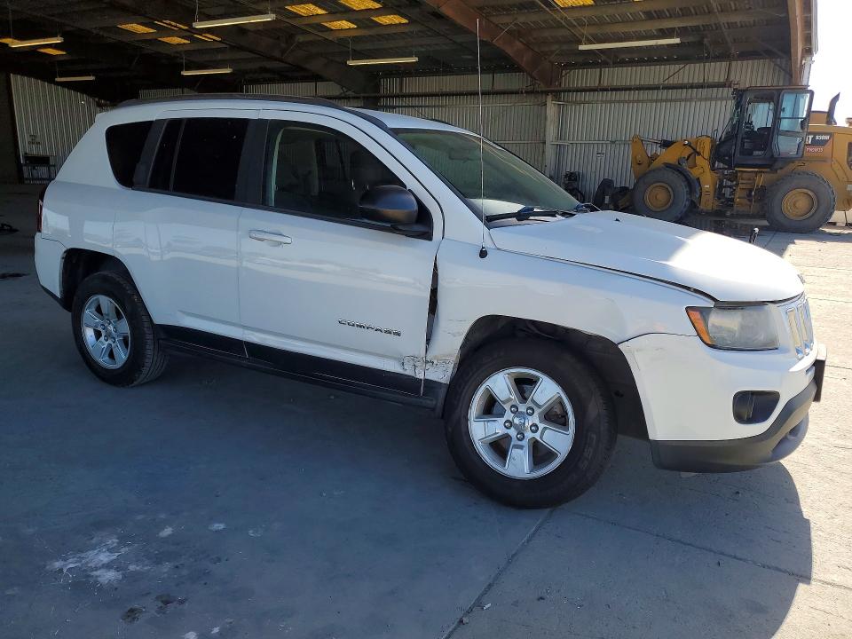 Photo 4 from auction – 2014 JEEP COMPASS with VIN 1C4NJCBAXED882191