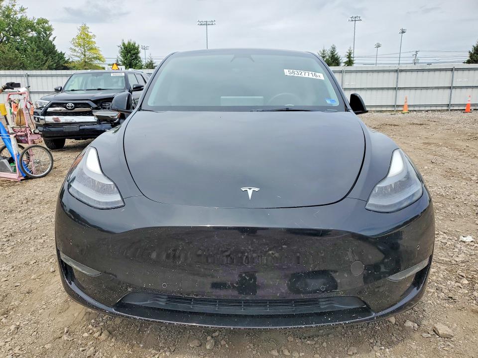 Photo 5 from auction – 2022 TESLA MODEL Y with VIN 7SAYGDEF1NF345763