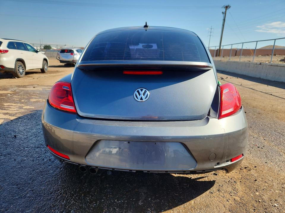 Photo 6 from auction – 2013 VOLKSWAGEN BEETLE with VIN 3VWJX7AT5DM658141