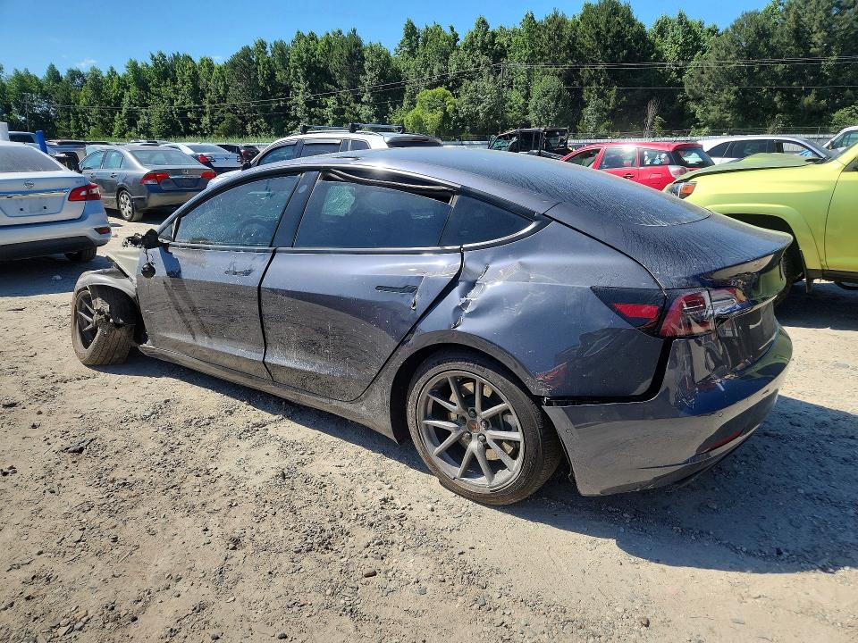 Photo 2 from auction – 2021 TESLA MODEL 3 with VIN 5YJ3E1EA0MF017541
