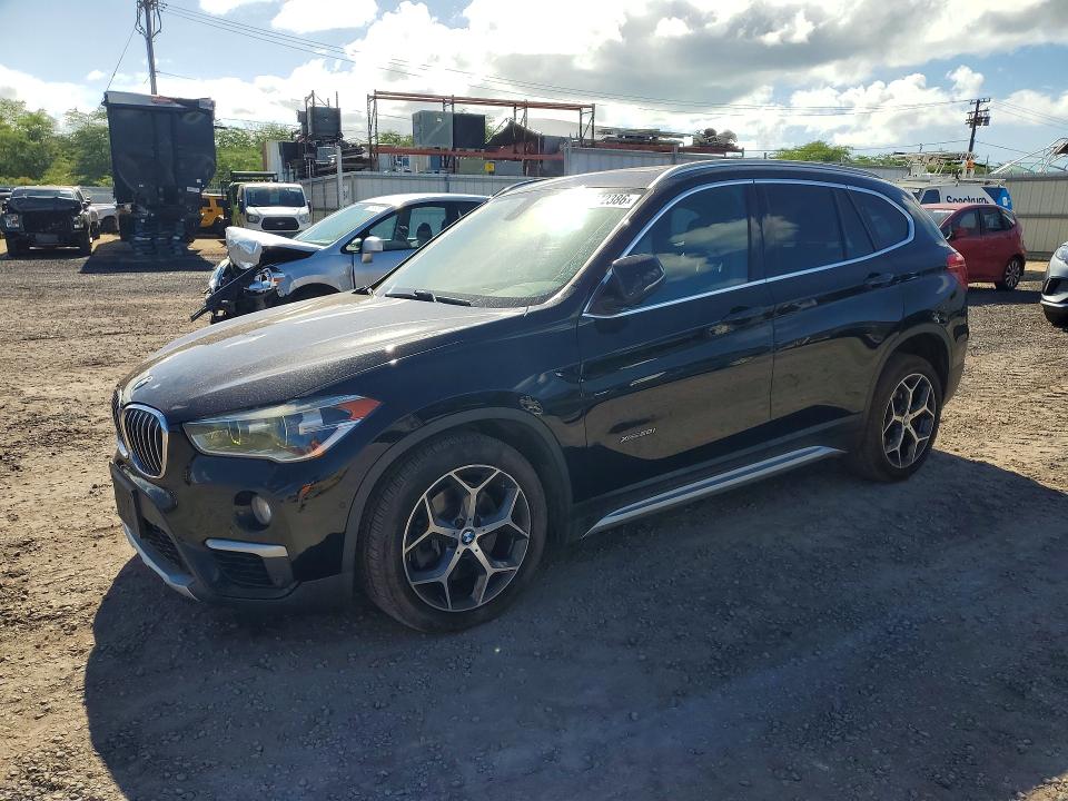 BMW X1 2017 with VIN WBXHT3C37H5F69319 - Photo from auction
