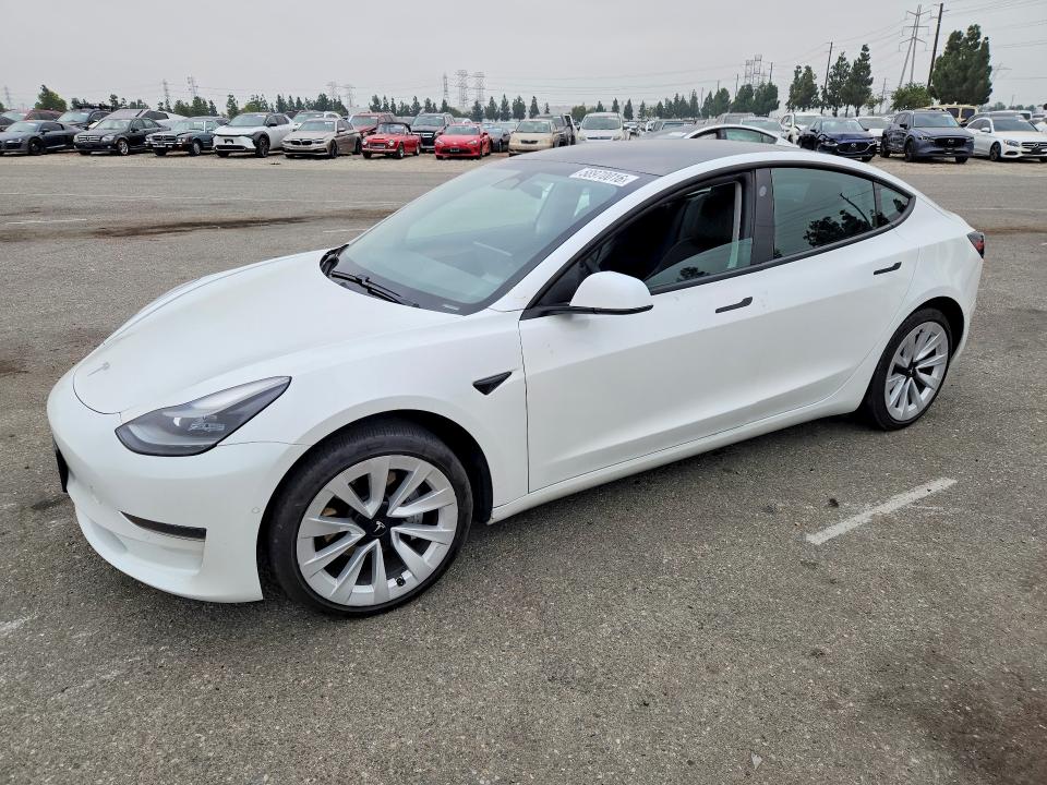 TESLA MODEL 3 2021 with VIN 5YJ3E1EA1MF977855 - Photo from auction