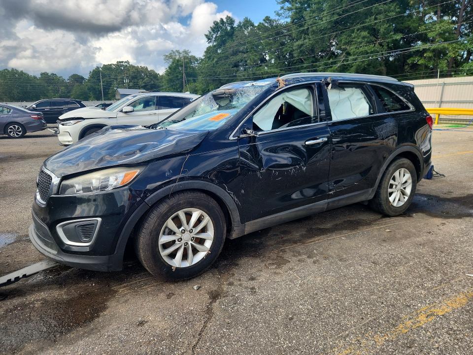 KIA SORENTO 2017 with VIN 5XYPG4A30HG301979 - Photo from auction