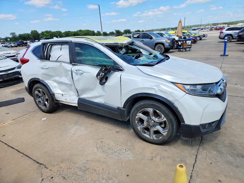 Photo 4 from auction – 2019 HONDA CR-V with VIN 7FARW1H80KE026175