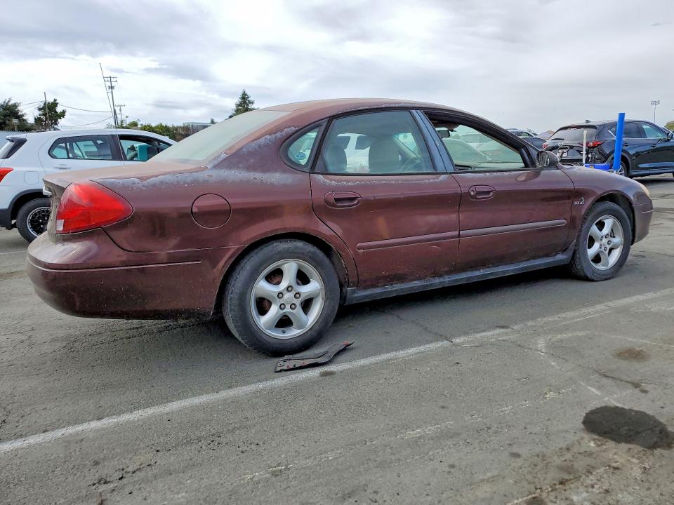 Photo 3 from auction – 2000 FORD TAURUS with VIN 1FAFP5525YG146528