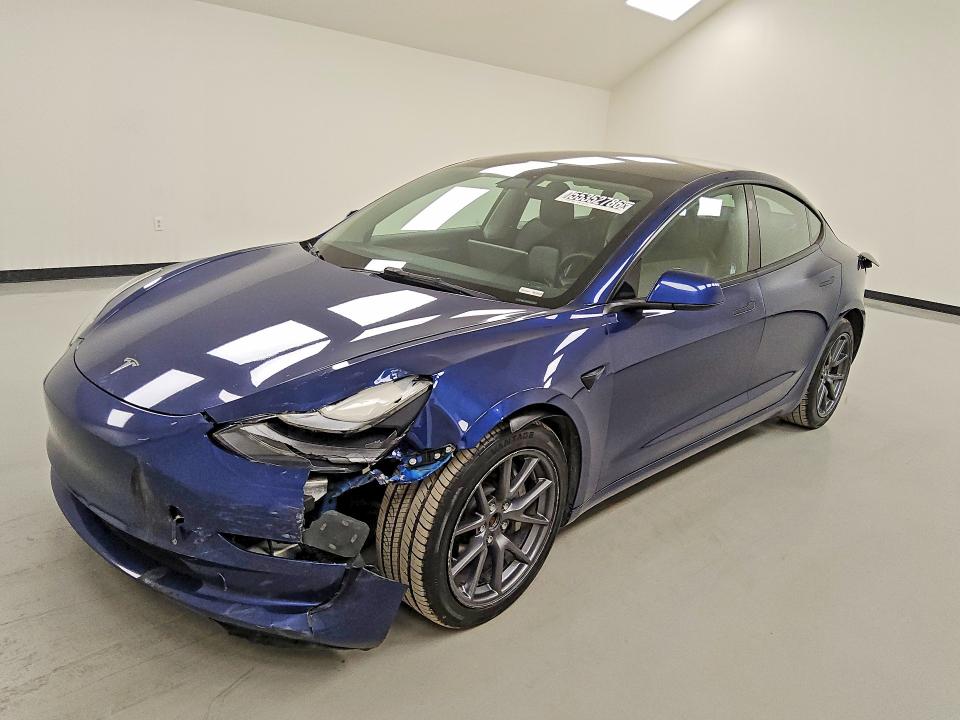 TESLA MODEL 3 2022 with VIN 5YJ3E1EB0NF286634 - Photo from auction
