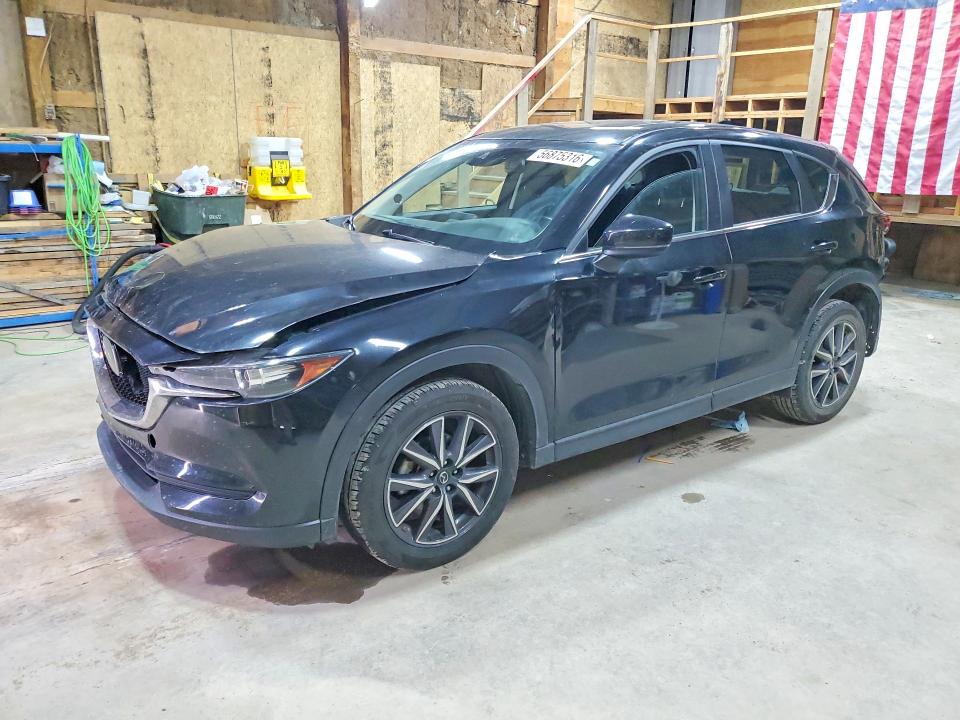 MAZDA CX-5 2018 with VIN JM3KFACM7J0417328 - Photo from auction