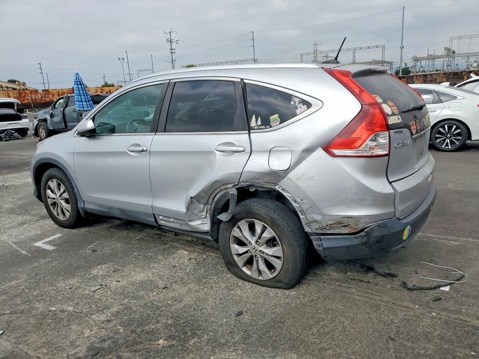 Photo 2 from auction – 2014 HONDA CR-V with VIN 2HKRM3H74EH559365