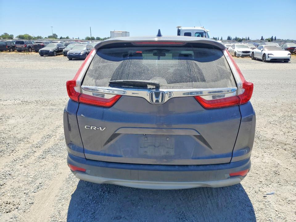 Photo 6 from auction – 2018 HONDA CR-V with VIN 2HKRW1H59JH508581