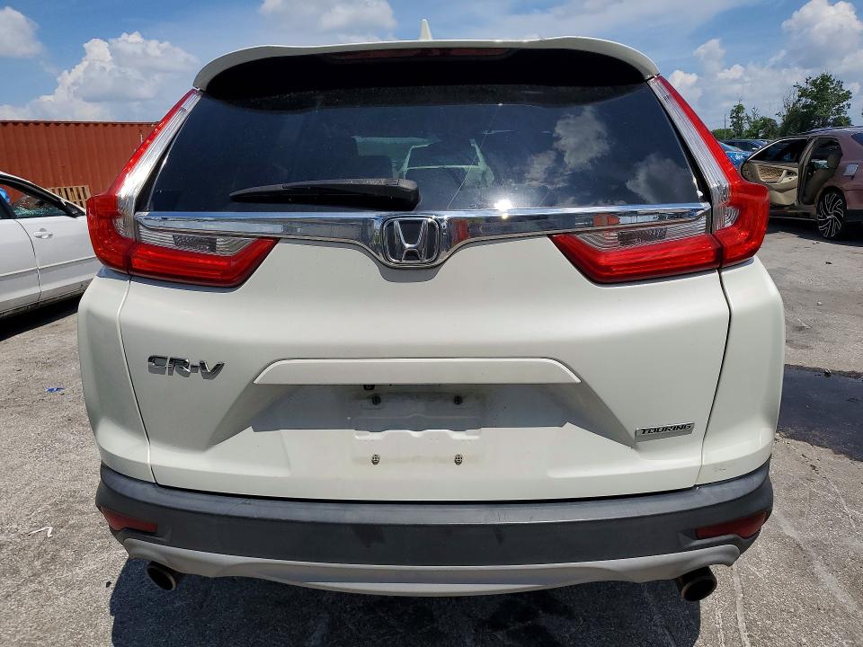 Photo 6 from auction – 2017 HONDA CR-V with VIN 5J6RW1H97HL012049