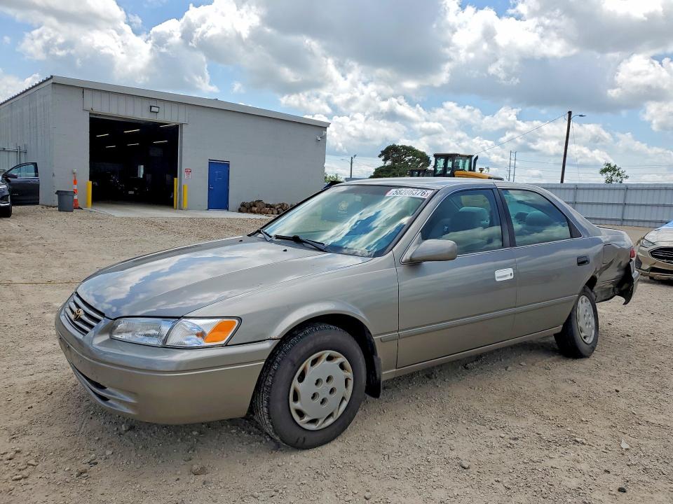 TOYOTA CAMRY 1997 with VIN 4T1BG22KXVU164138 - Photo from auction