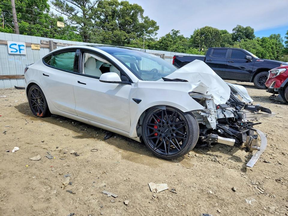 Photo 4 from auction – 2021 TESLA MODEL 3 with VIN 5YJ3E1EC4MF033243